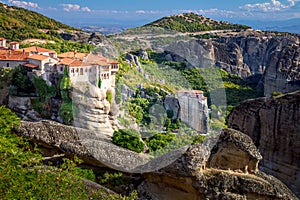 Meteora monasteries, Greece. Panoramic view on the Holy Monastery of Varlaam placed on the edge of high rock. The Meteora area is