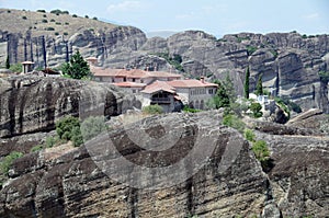 Roofs of the monastery among the rocks of Meteora, Greece photo