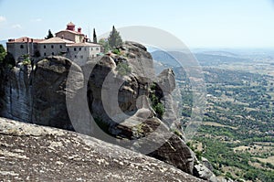 Amazing view of the Monastery of Saint Stephen and the valley at the foot of the mountains in Meteora, Greece photo