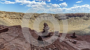 The meteorite crater near Winslow, Arizona with foreground rock pile photo