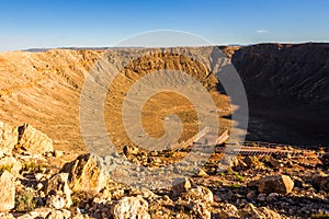 Meteorite impact crater in Arizona desert photo