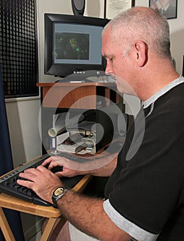Meteorologist at the Computer