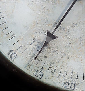 Meter needle old barometer closeup