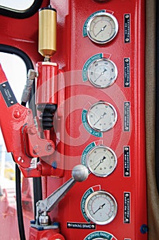 Meters or gauge in crane cabin for measure Maximun load, Engine speed , Hydraulic pressure , Temperature and fuel level