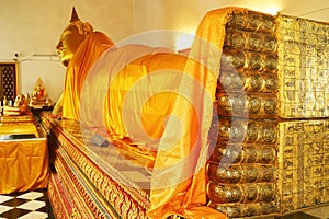 Reclining Buddha Image of Wat Poramai Yikawat Buddhist Temple in Koh Kred Island, Nonthaburi, Thailand photo