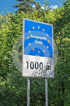 1000 meters to Republic of Poland Rzeczpospolita Polska sign. Sign near Polish and Slovak border photo