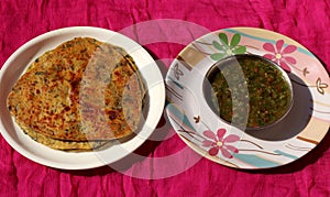 Methi Paratha with green chilli sauce