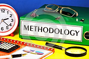 Methodology-text label on the Registrar`s folder. photo