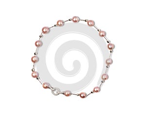 A meticulously crafted necklace, presenting multiple lustrous pink pearls threaded together. Enhanced by a finely detailed