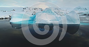 Meting ice glacier in Antarctica close up panorama