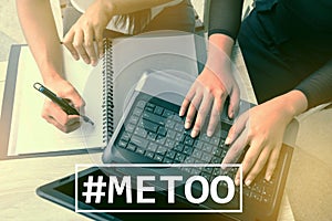 MeToo hashtag on workplace background. metoo as a new movement. photo