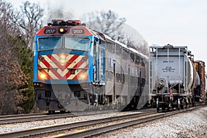 Metra commuter train passes freight train east of Joliet