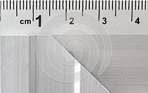 Metric scale. Yardstick. Close-up. Steel ruler millimeter markings.