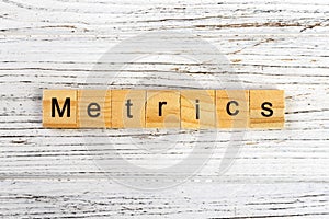 METRICS word made with wooden blocks concept photo