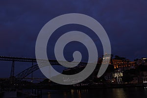 Metro over Pedro V Bridge at night in Oporto