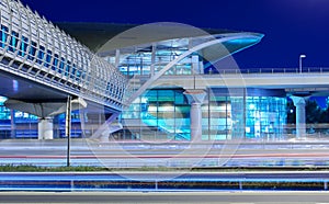 Metro subway station at night in Dubai, UAE.