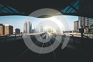 Metro track with skyline of Dubai - UAE