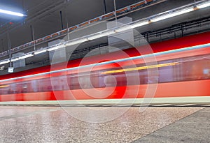 Metro train with speed enters the train station in Frankfurt