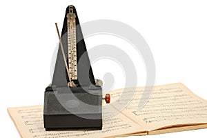 Metronome on sheet music photo