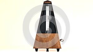 Metronome On Table With Arm Moving At Andante Tempo