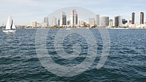 Metropolis urban skyline, highrise skyscrapers of city downtown, San Diego Bay, California USA. Waterfront buildings near pacific