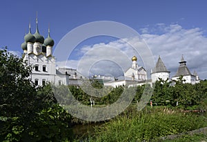 Metropolitan Garden with pond and apple trees and the Church of St. Gregory the Theologian of the 17th century in the Kremlin in