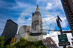 The Metropolitan Life Insurance Company Tower and Broadway street sign in Manhattan, New York.