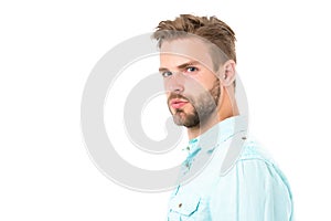 Metrosexual concept. Man bristle serious strict face looks back, isolated white. Man beard unshaven guy looks handsome