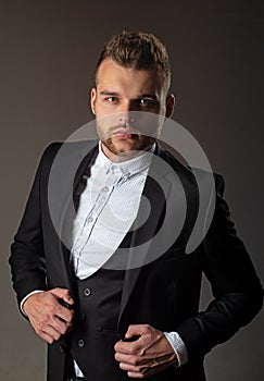 Metrosexual. Modern man suit fashion. Man in classic suit shirt. Portrait of handsome serious male model. Ambition and