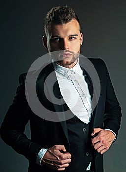 Metrosexual. Modern man suit fashion. Man in classic suit shirt. Portrait of handsome serious male model. Ambition and