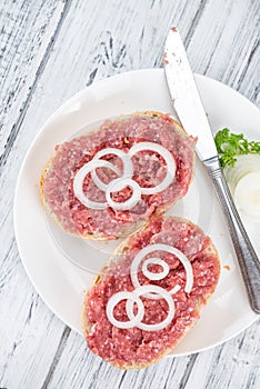 Mett on a bun (German cuisine; selective focus)