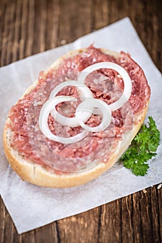 Mett on a bun (German cuisine; selective focus)