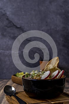 mexican breakfast, chilaquiles with egg and toasted bread, chorizo de un costado deep dish photo