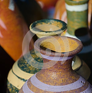 Mexican ceramic pots with tall necks in market at Old Town