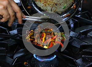 Mexican chicken fajitas on sizzling plate