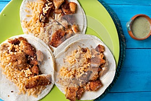 Mexican chicken milanese tacos with red rice