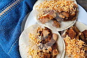 Mexican chicken milanese tacos with red rice