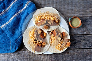 Mexican chicken milanese tacos with red rice