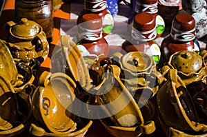 mexican clay pottery in a street market photo