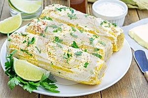 Mexican corn with butter, mayonnaise, parmesan, chili, cilantro, lime