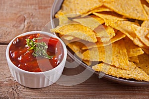 Mexican corn chips nachos with salsa dip