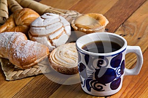 Mexican coffee and sweet bread photo