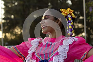 Mexican folkloric dancer with traditional costume photo