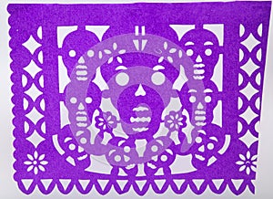 Mexican dia de muertos papel picado cut paper skull art photo