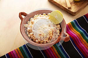 mexican esquites in clay bowl photo