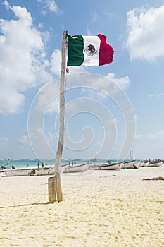 Mexican flag in beach
