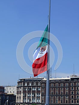 Mexican flag in mornin at the zocalo