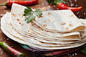 Mexican flatbread tortilla on wooden board