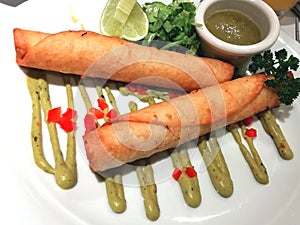 Mexican flautas, chicken or beef flautas. Tacos dorados, deep fry tacos photo