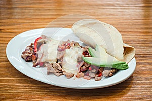 Mexican food, Alambre is made with Beef, onion, bacon, chili, cheese and tortillas in Mexico